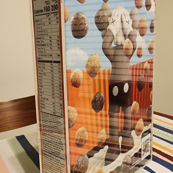 Reese's Puffs - KAWS Cereal In Display Case - Picture 3 of 3